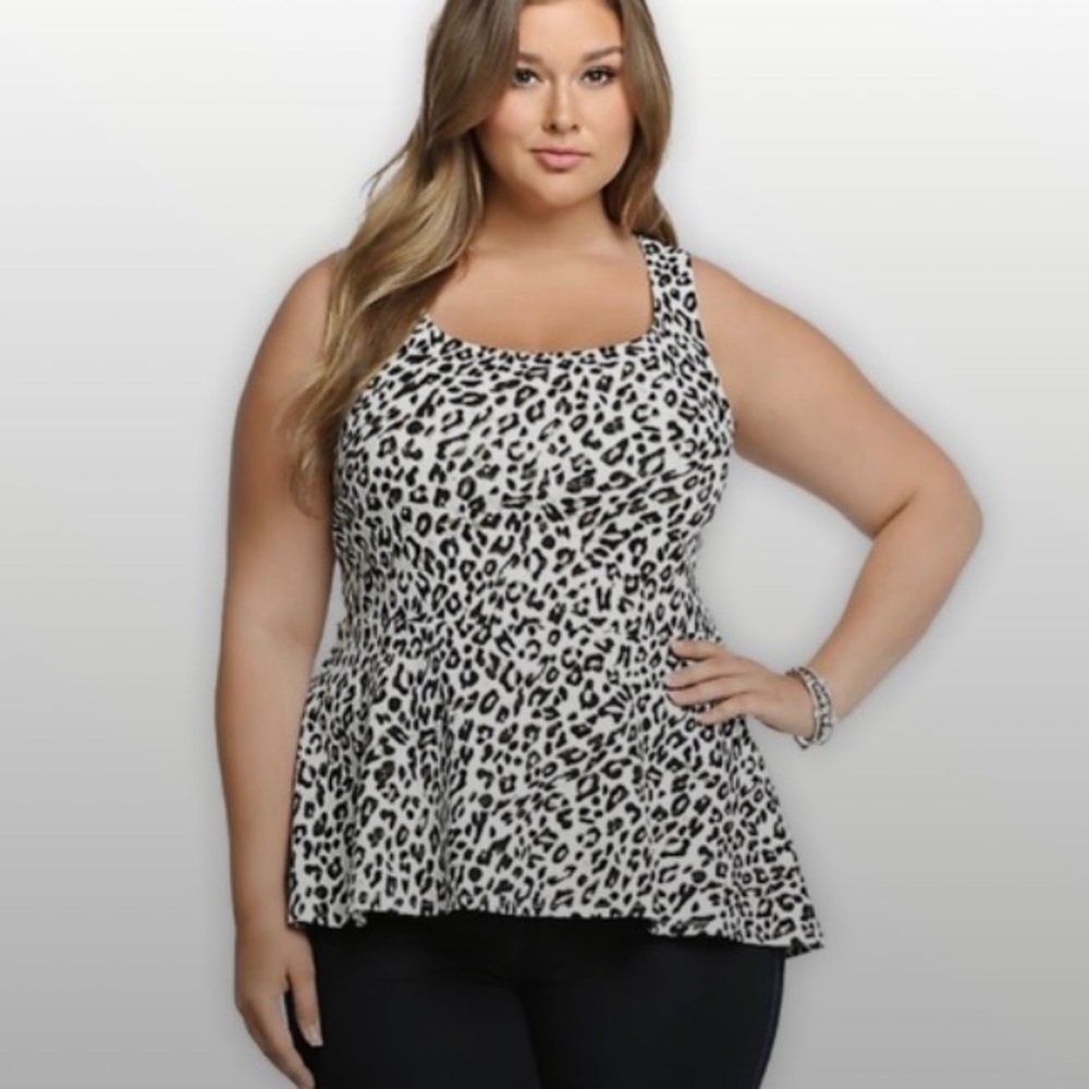 Torrid animal print peplum top Size 4